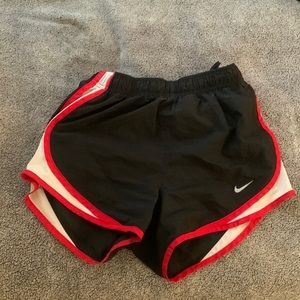 Red and black Nike shorts